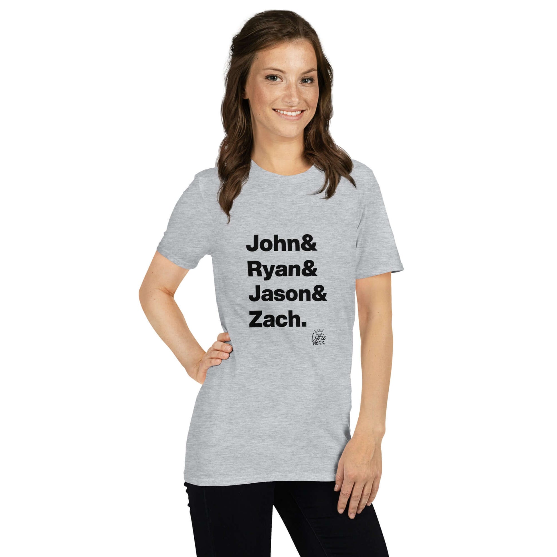 Woman wearing 'Americana Heroes' short-sleeve unisex t-shirt with names John, Ryan, Jason, Zach on front