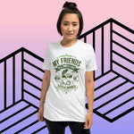 Woman wearing "My Friends All Smell Like Weed or Little Babies" short-sleeve unisex t-shirt against geometric background.