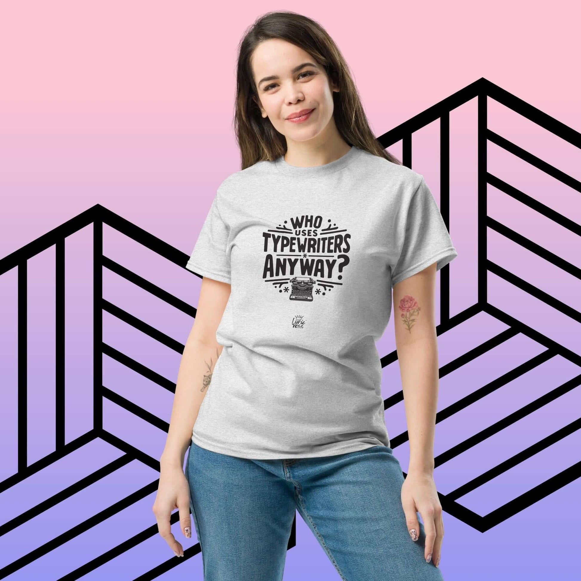 Unisex short-sleeve t-shirt with "Who Uses Typewriters Anyway?" text, worn by a person, perfect for casual streetwear outfits.